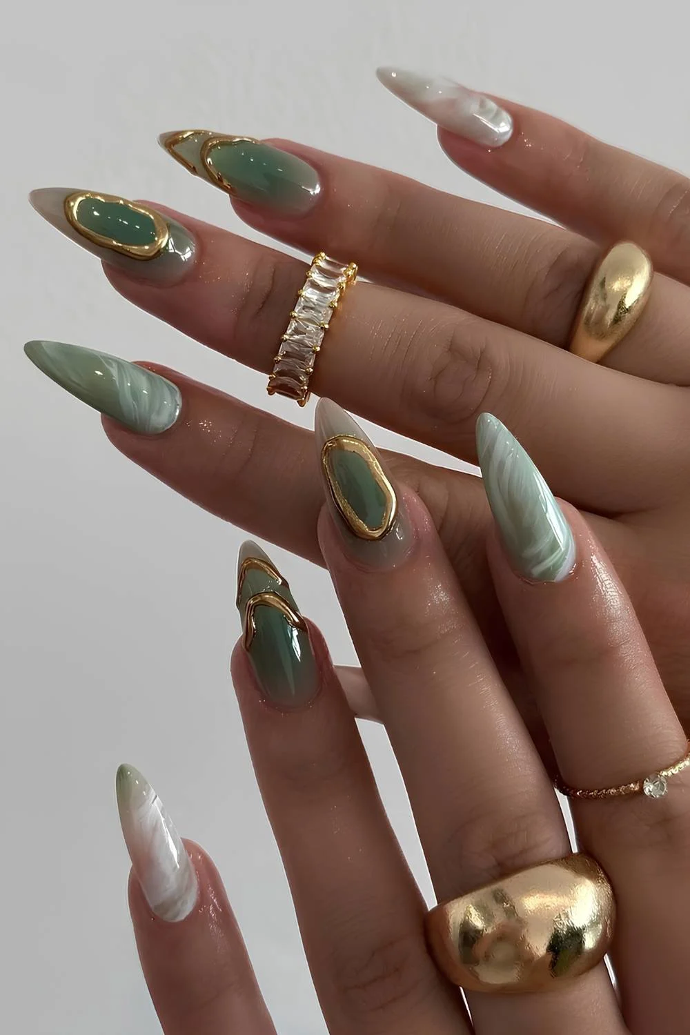 Jade green mani with gold and marble accents