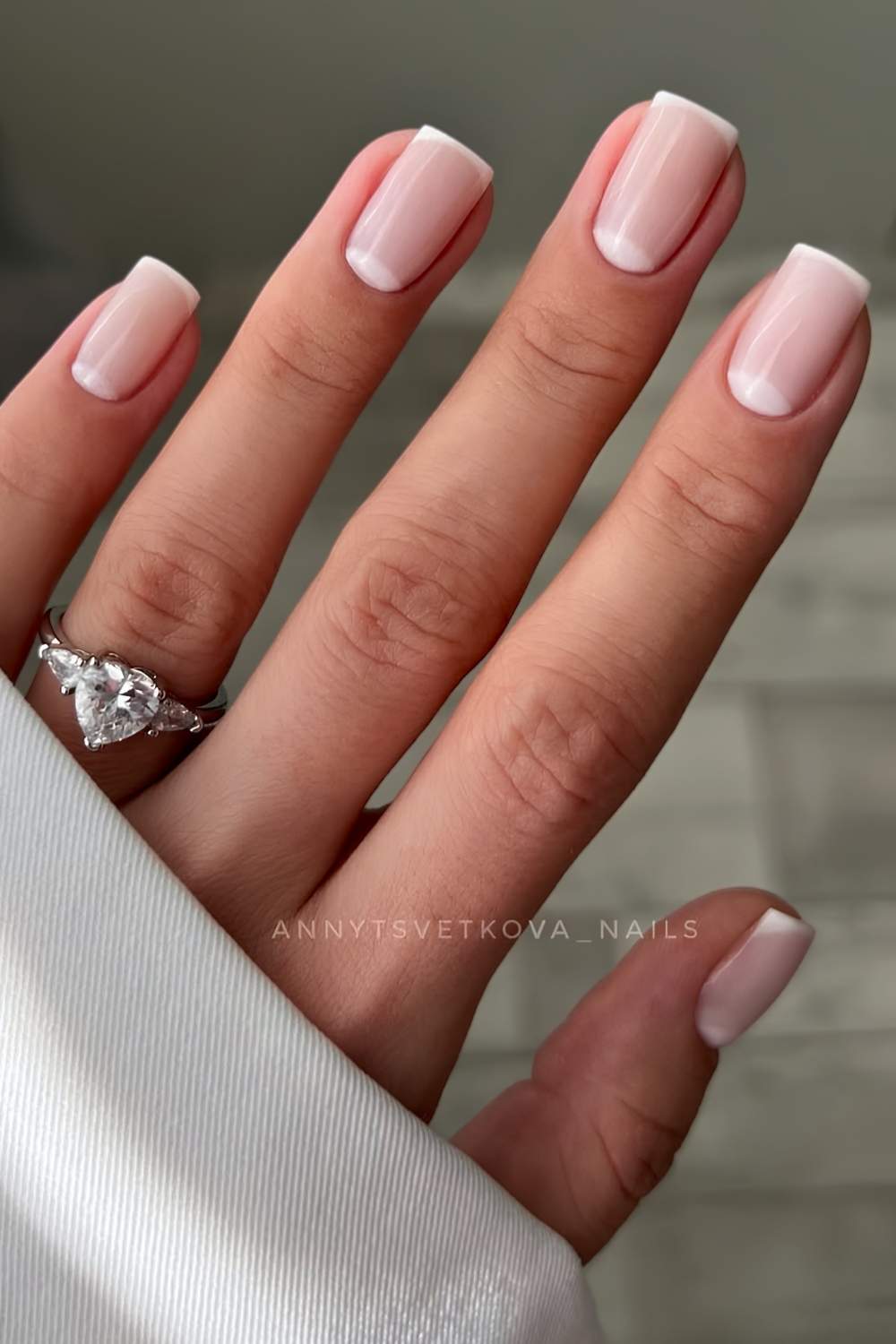 Micro white French nails with accent half moon art