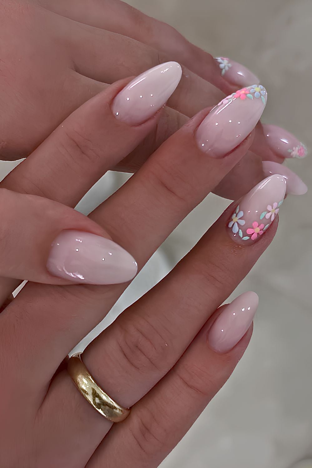 Milky white nails with accent pastel flowers