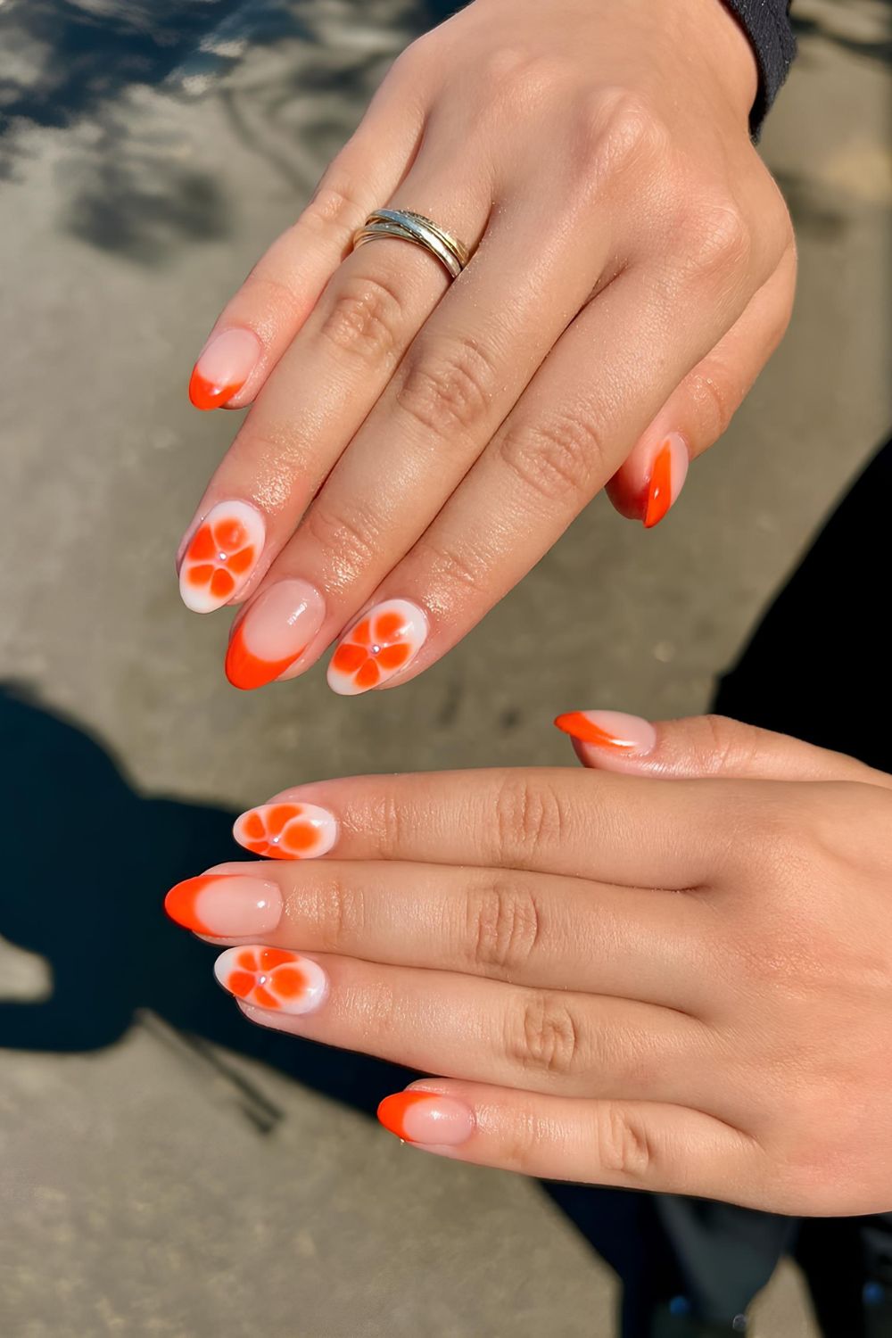 Neutral and milky nails with blooming flower accents
