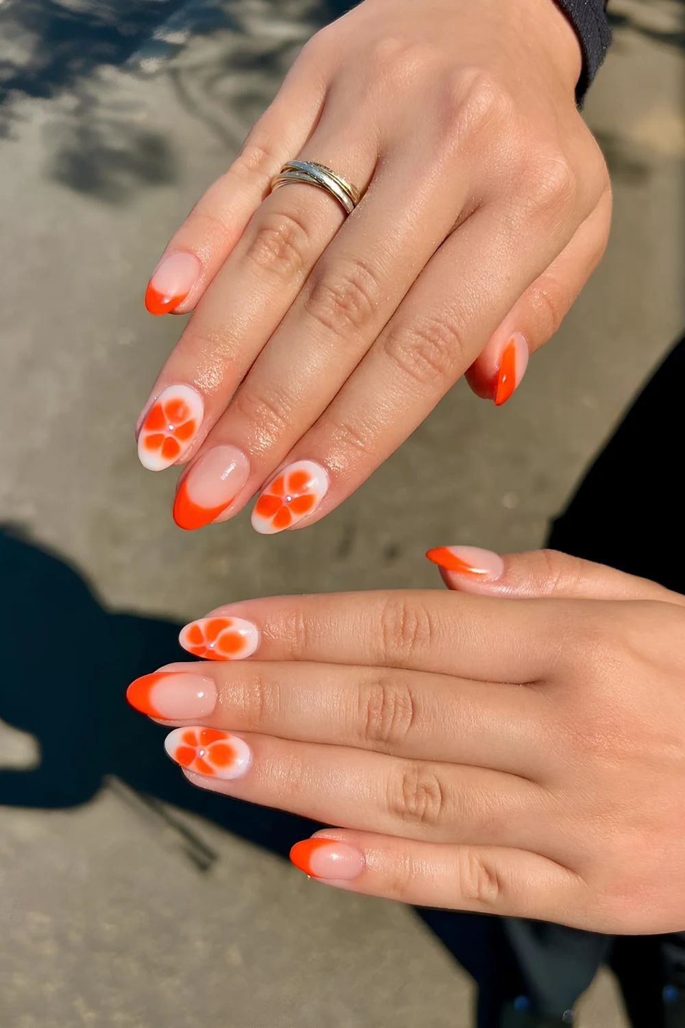 Neutral and milky nails with blooming flower accents