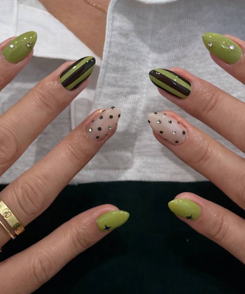 Olive green nails with stripes and dots