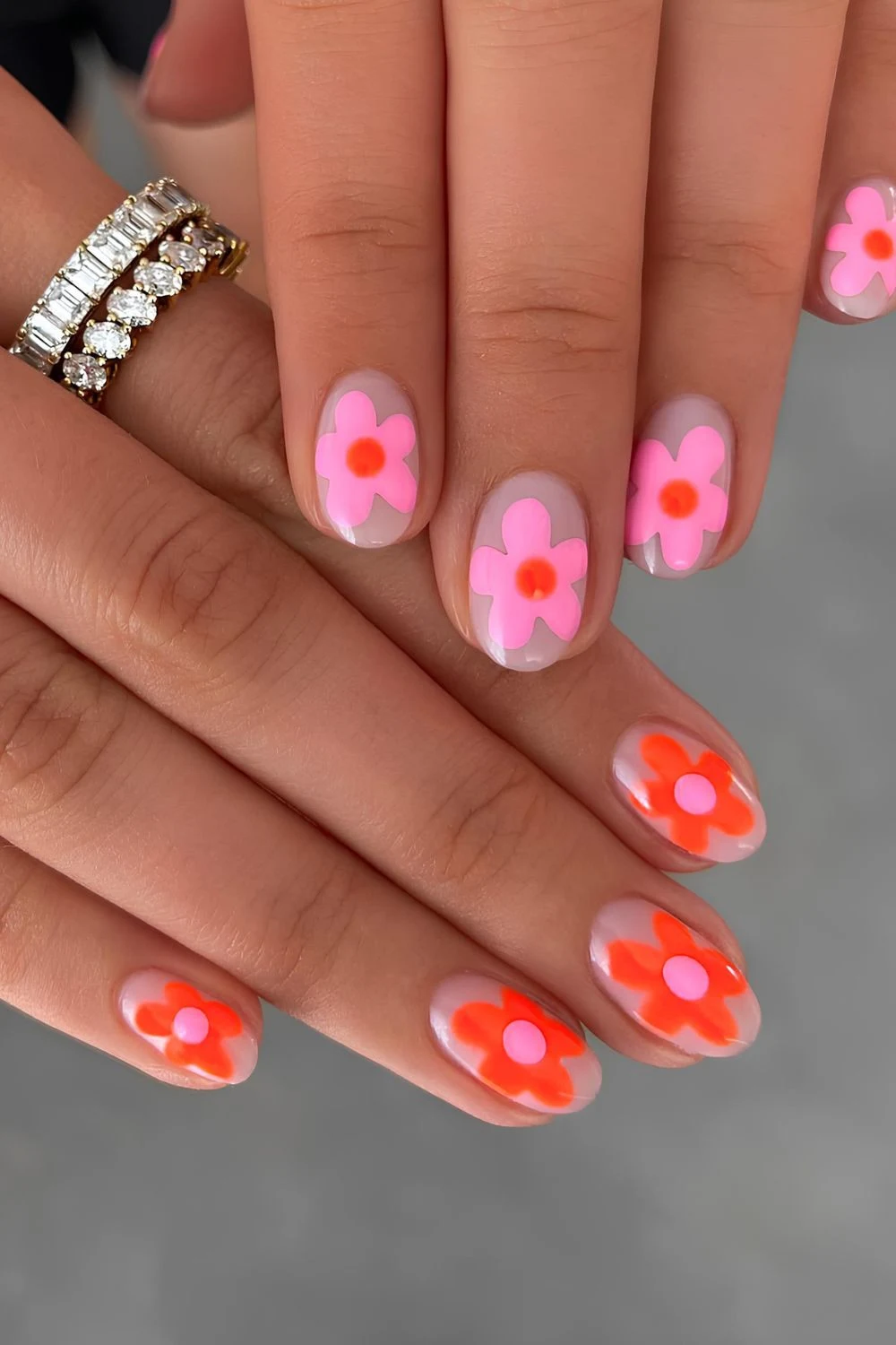 Orange and pink chunky floral nails