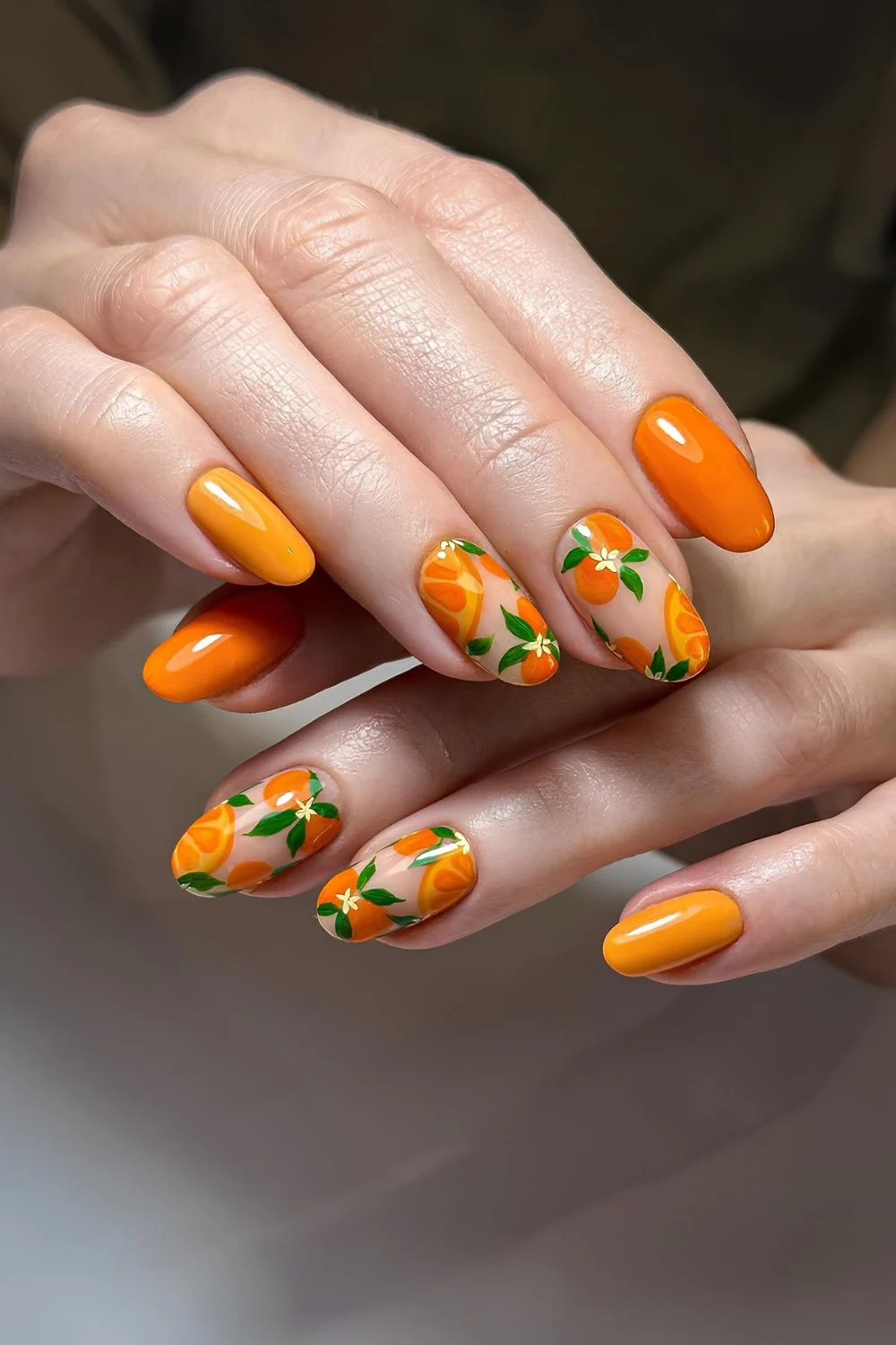 Orange nails with fruity accents