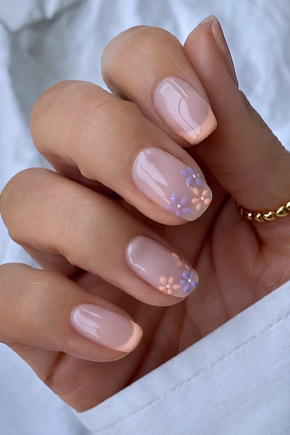 Peach French mani with lavender florals