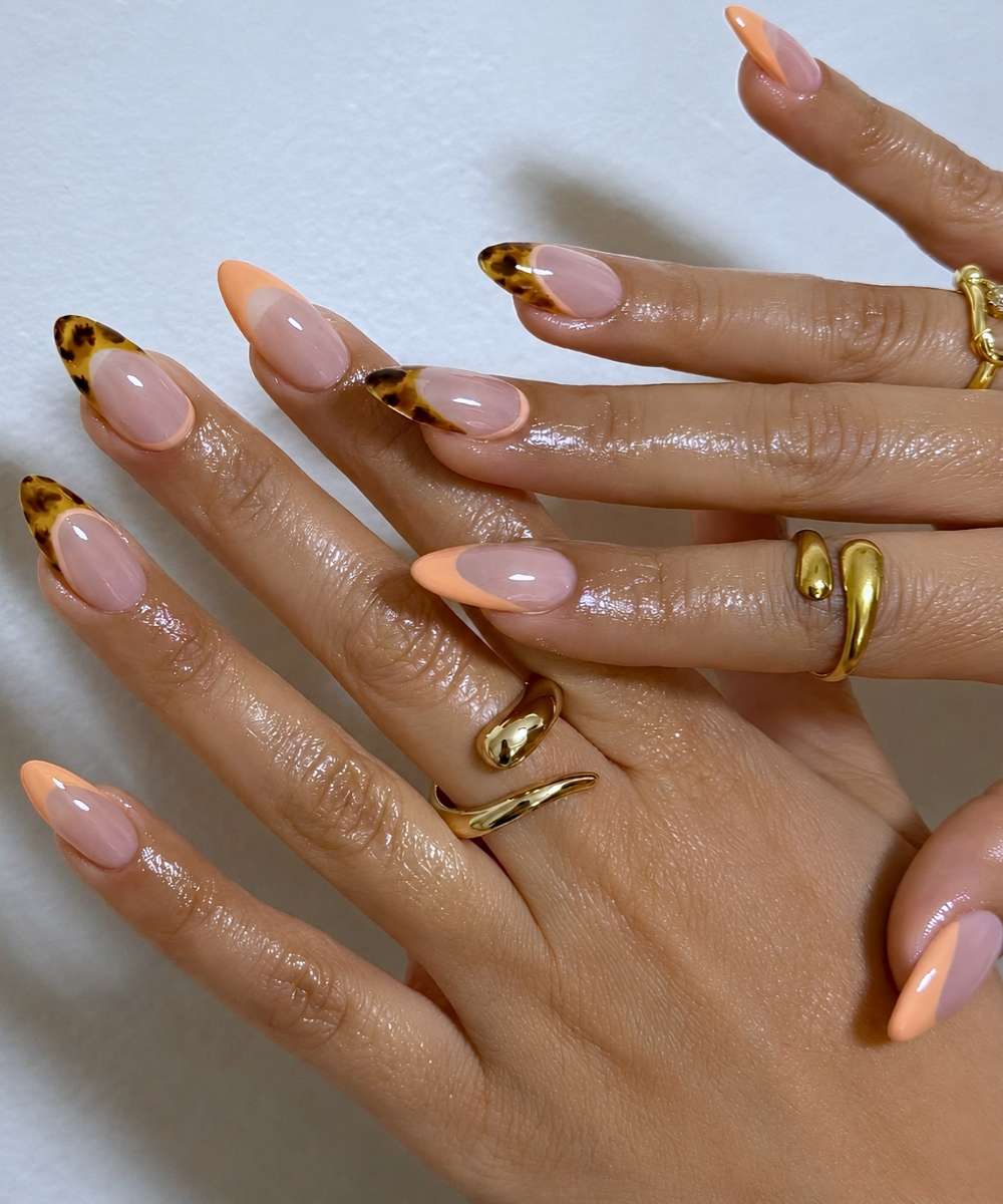 Peach French mani with tortie shell accents