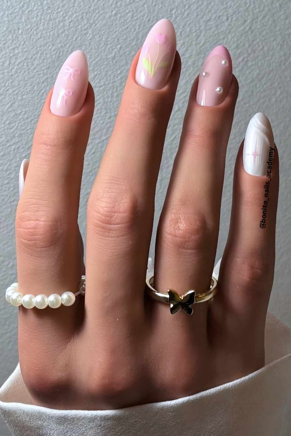 Pink and white nails with tulips and pearls