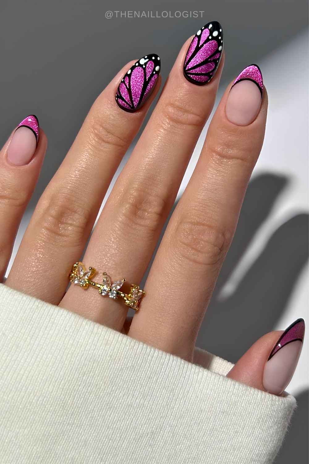 Pink velvet mani with black butterfly art