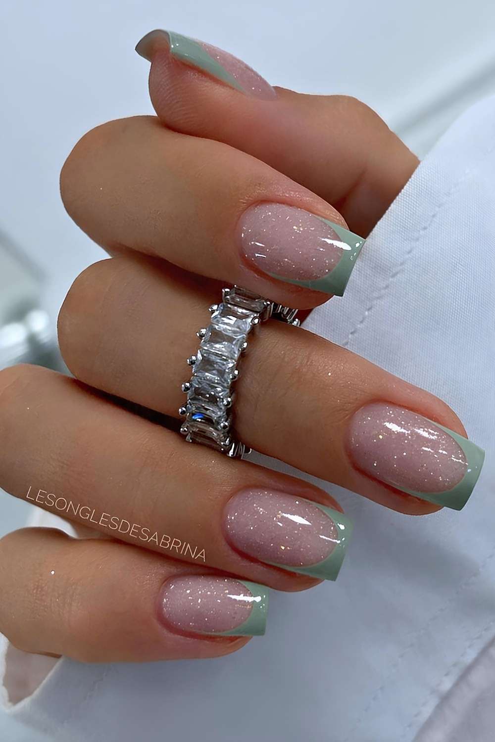 Sage green French mani on glitter base