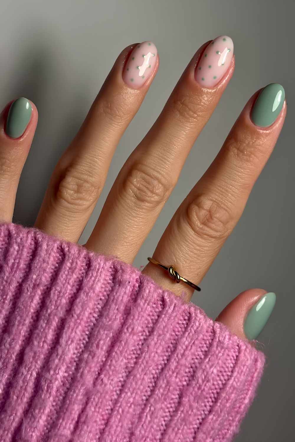 Sage green mani with accent polka dots
