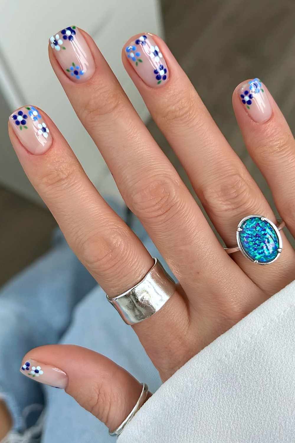 Sheer mani with blue micro florals