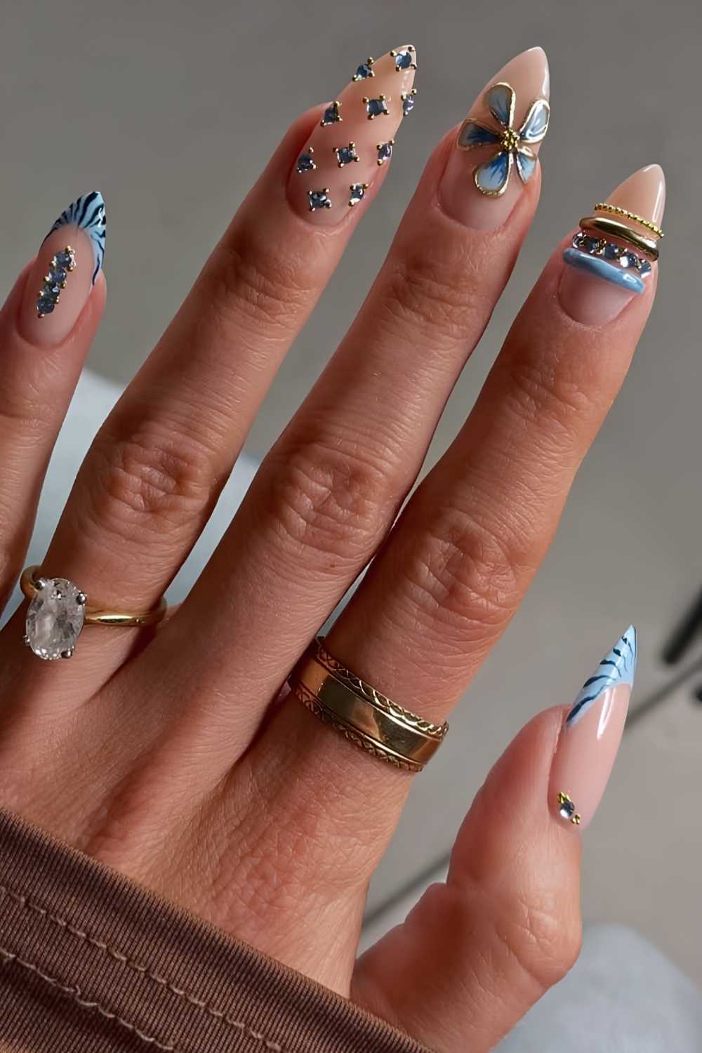Sheer nails with blue textured art