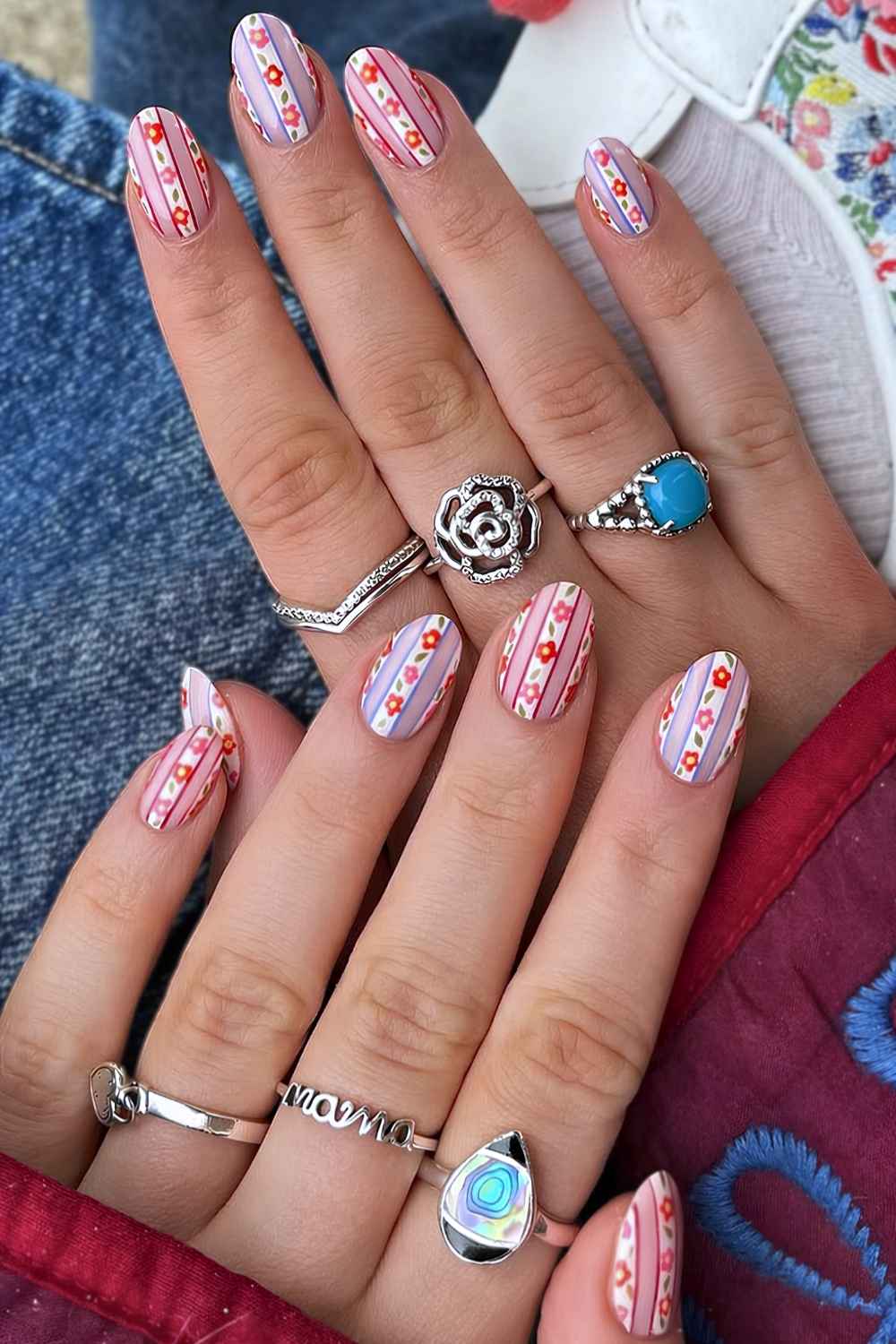 Sheer nails with stripes and red flowers