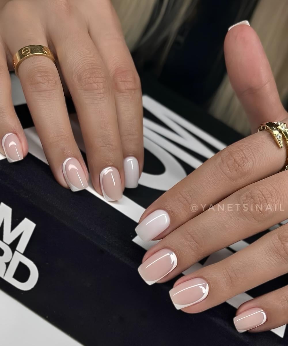 Short white nails with negative space design