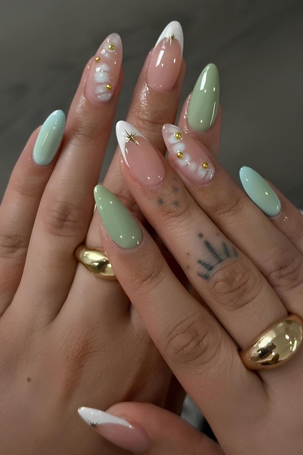 Soft green mani with white animal print accents