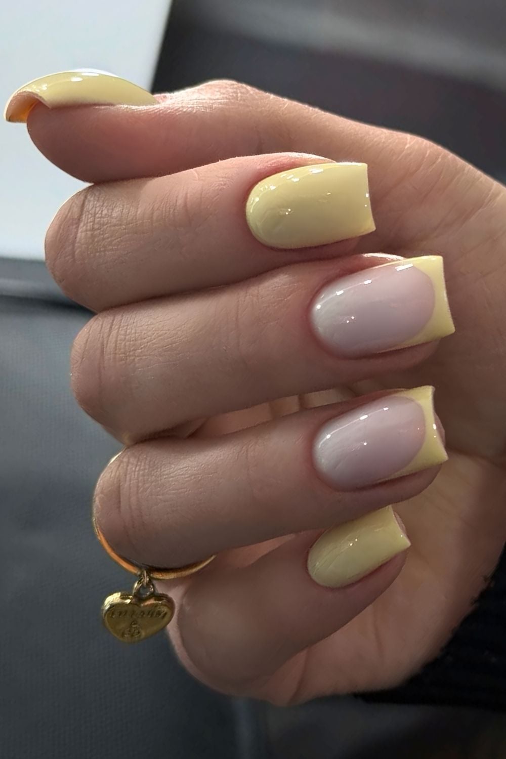 Square butter yellow mani with accent French tips