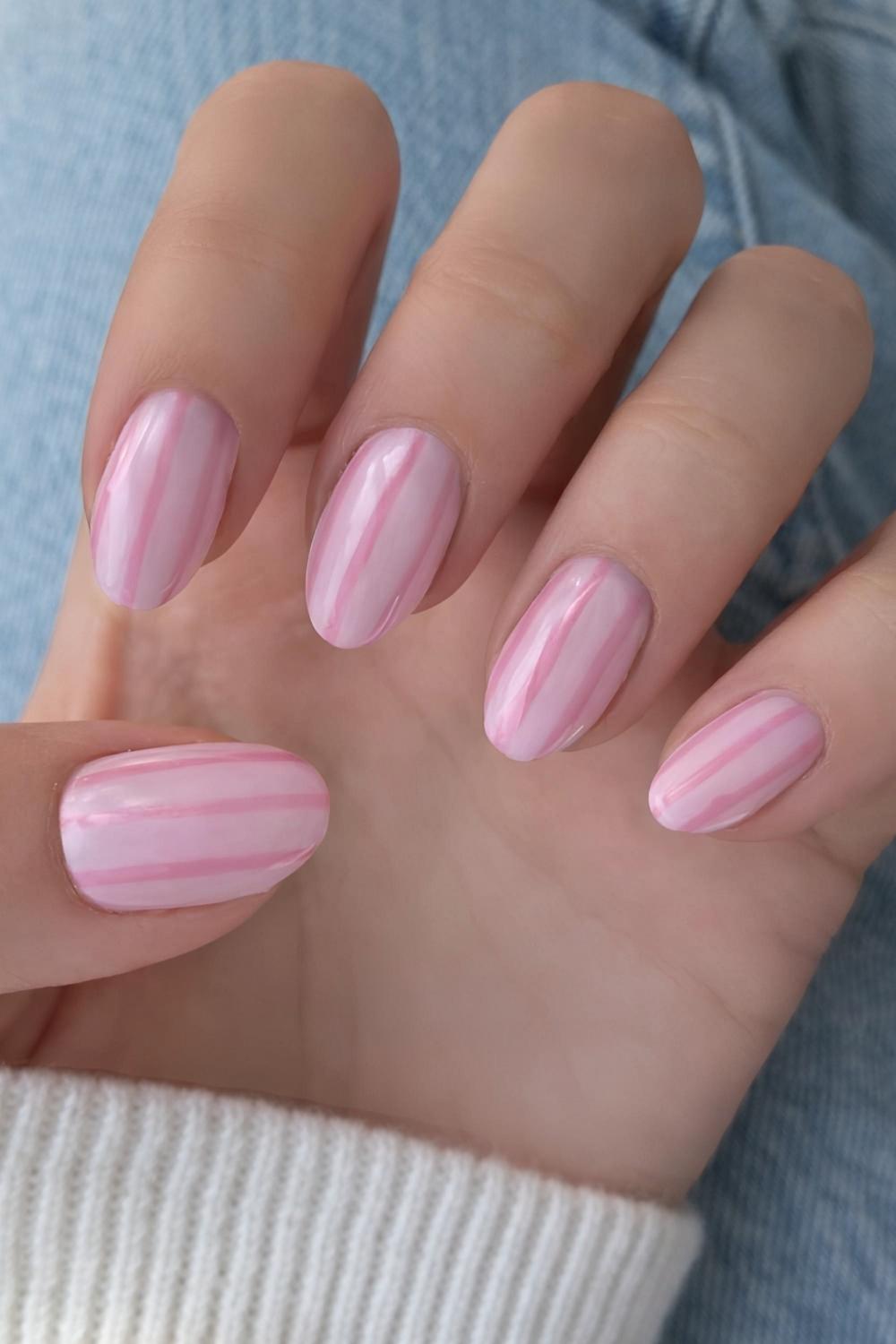 Striped nails in two pink shades