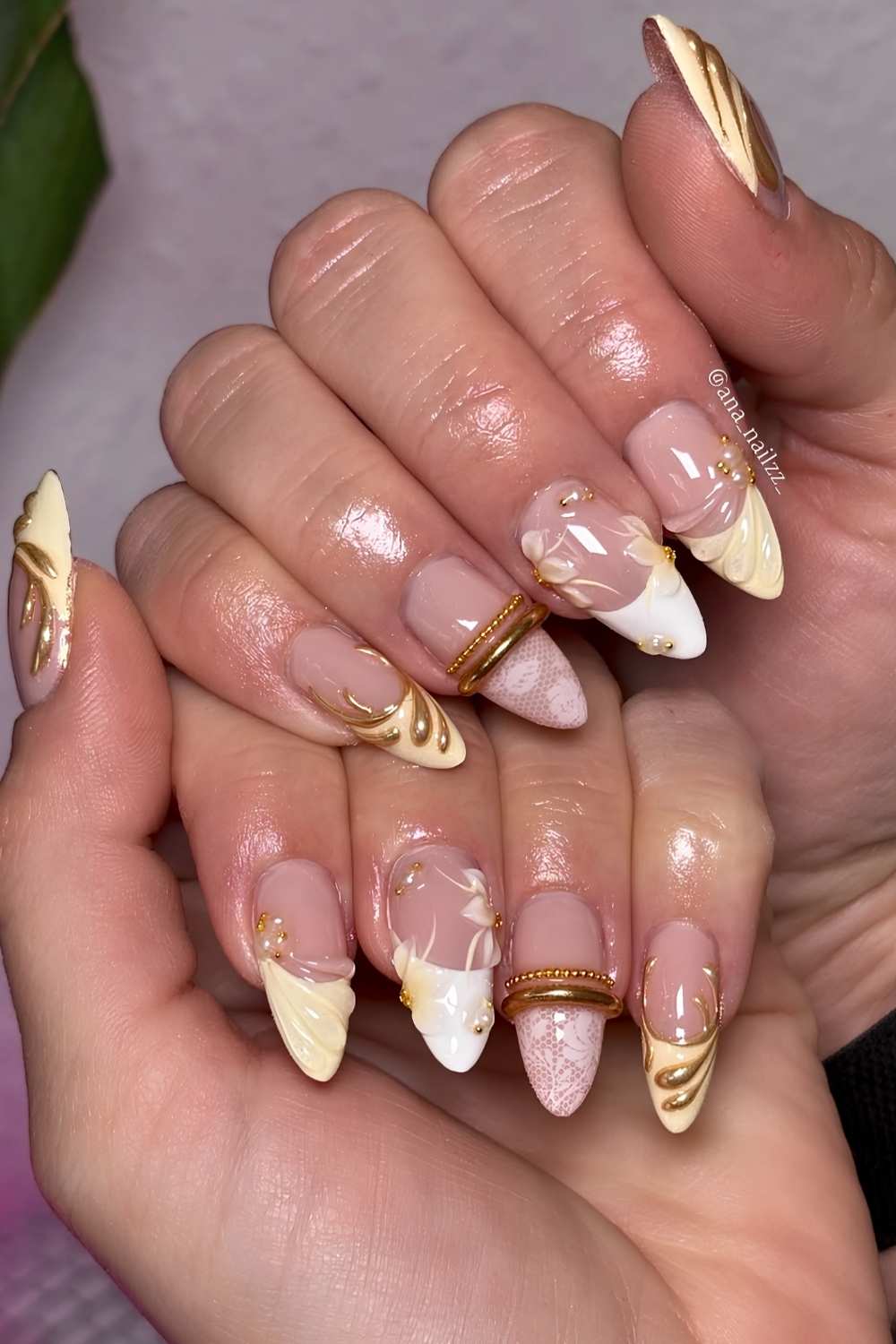 White and yellow nails with lace and bangle art