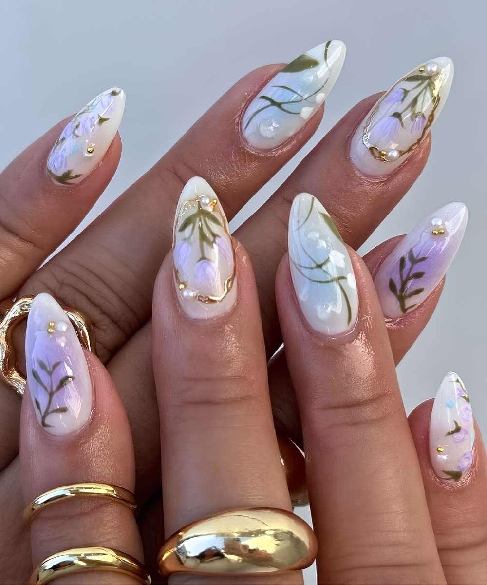White nails with aura and tulip art