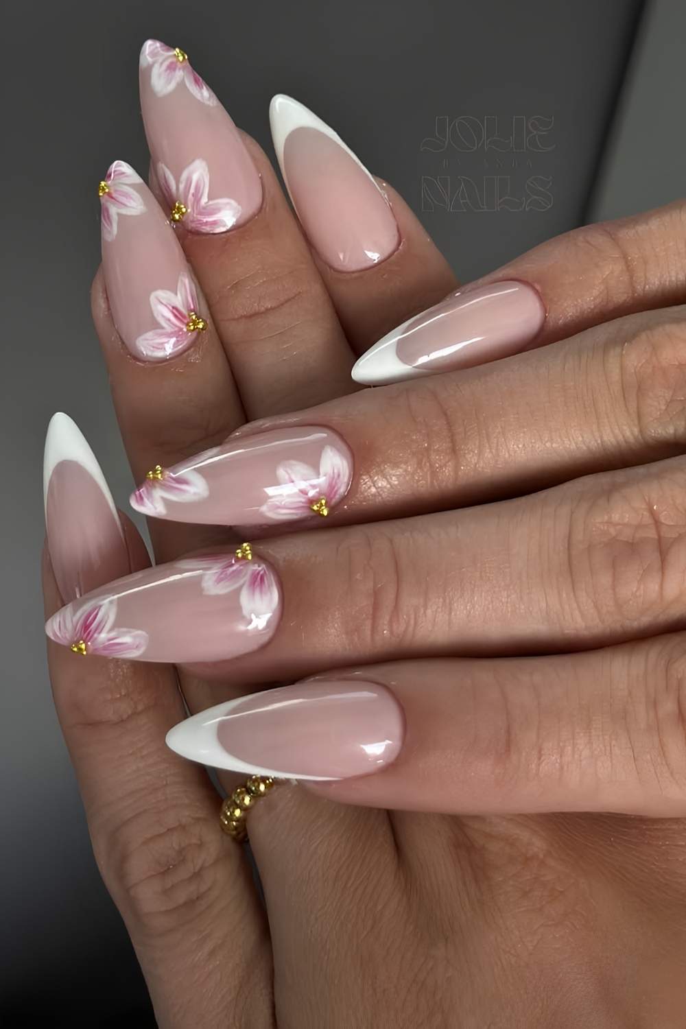 White spring French nails with cherry blossoms