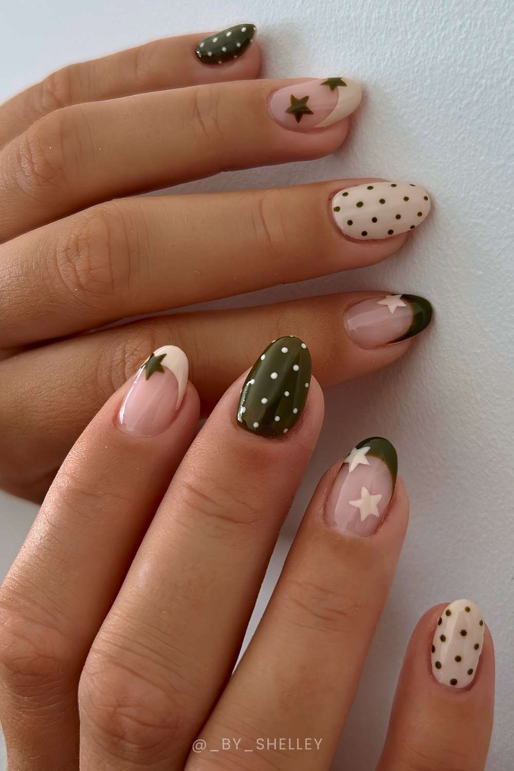 Beige and olive nails with stars and dots