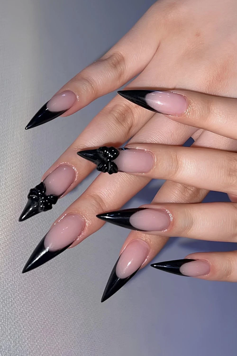 Black French mani with 3D bows