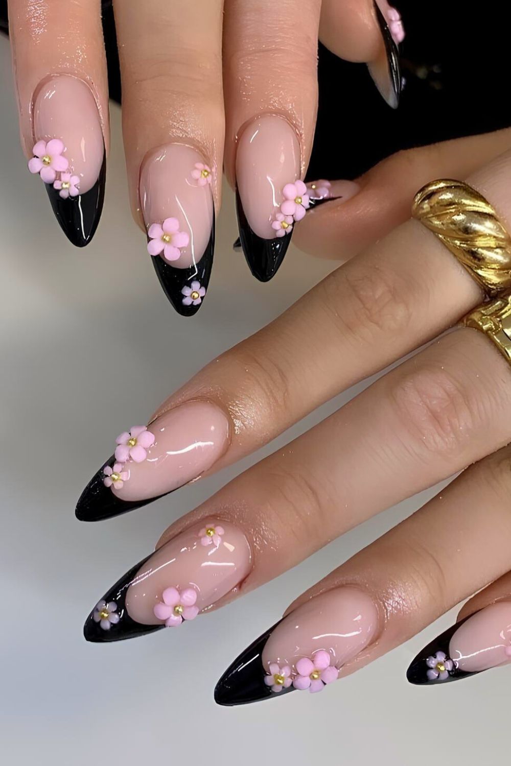 Black French nails with pink sculpted florals