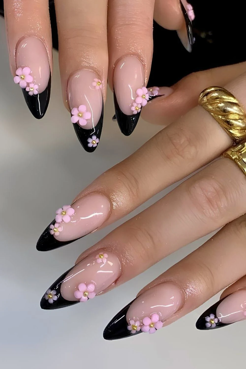 Black French nails with pink sculpted florals