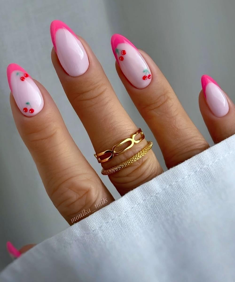 Bright pink French mani with cherry art