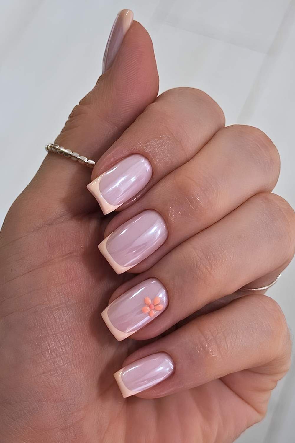 Chrome peach French mani with florals