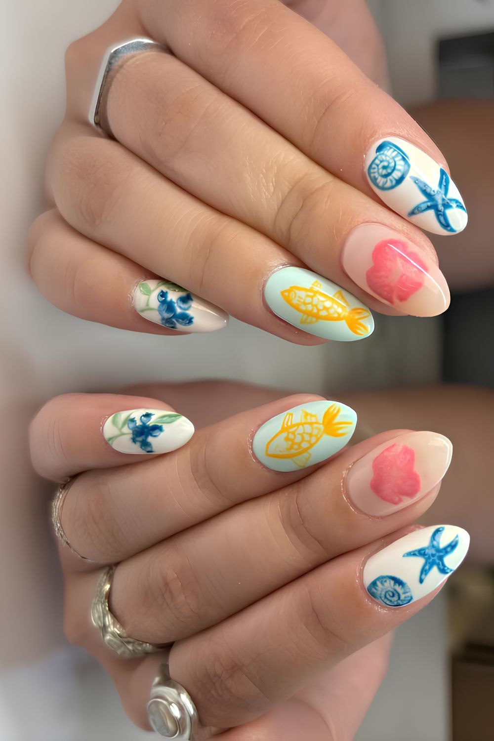 Colorful summer nails with fish motifs