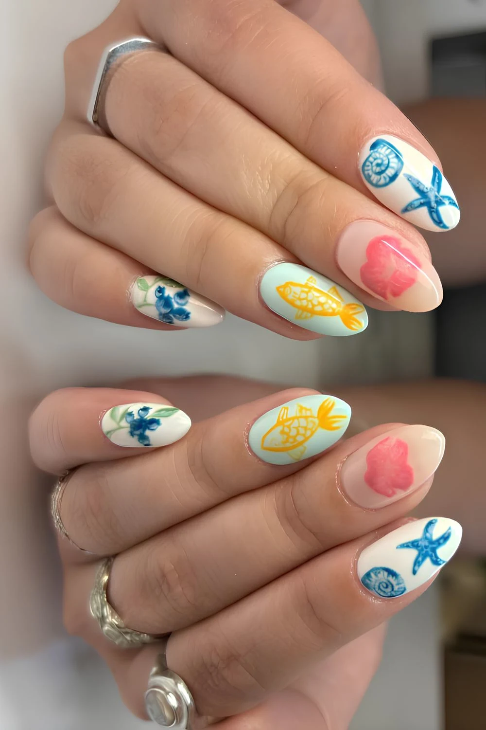 Colorful summer nails with fish motifs