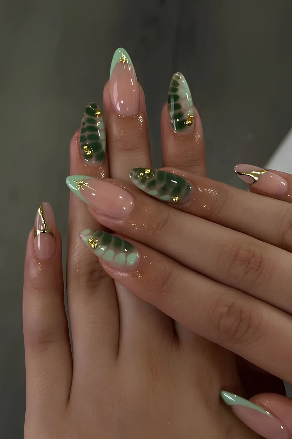 Dark and light green animal print nails