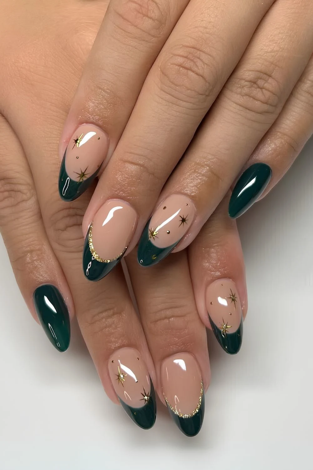 Dark green celestial French nails