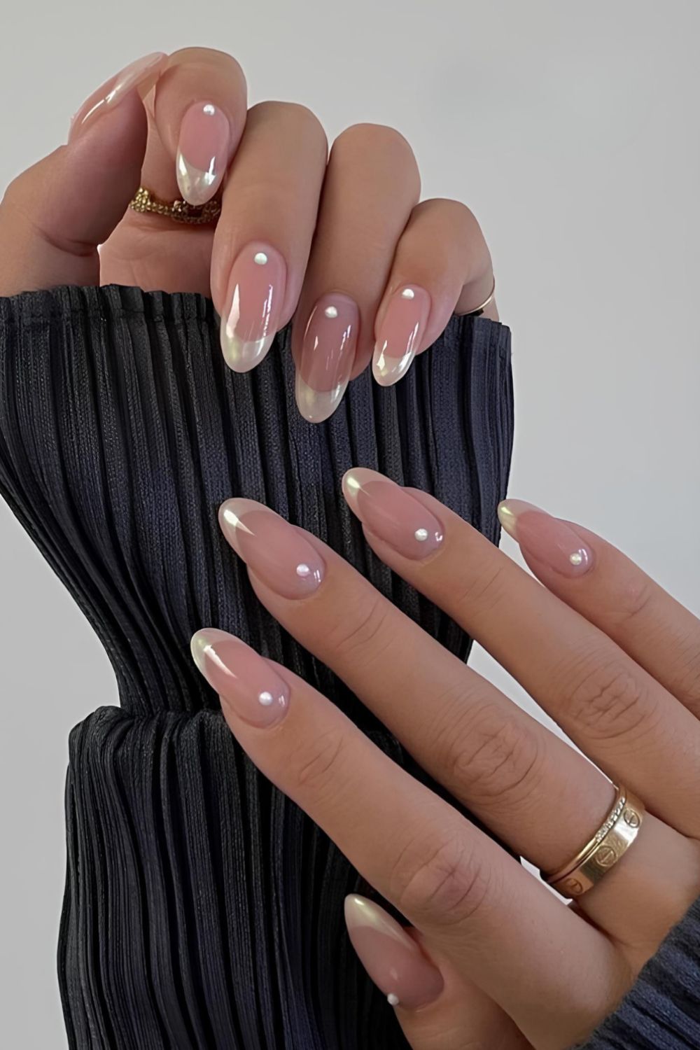 Glazed creamy white French nails with dot accents