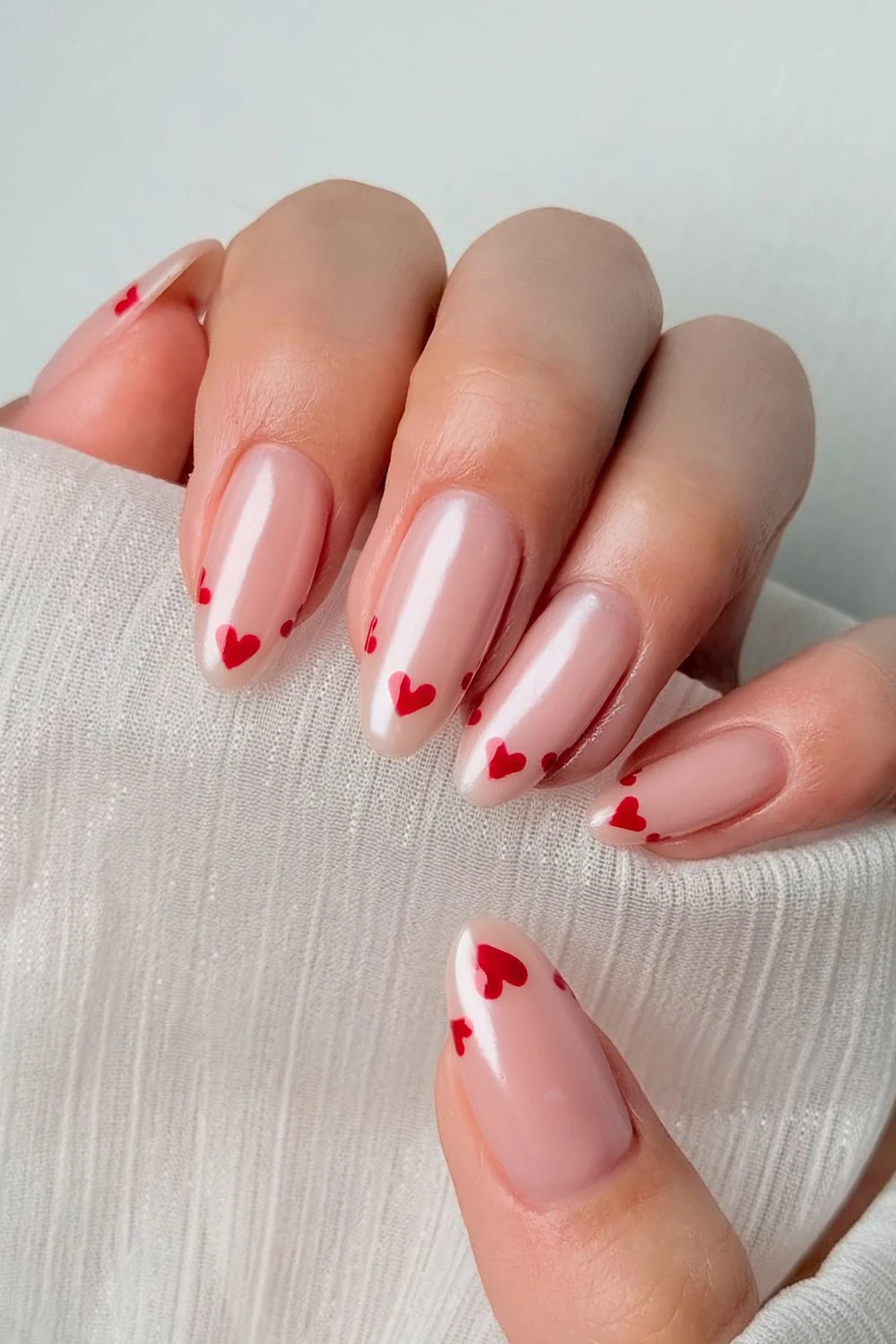 Glazed nails with red heart accents (1)