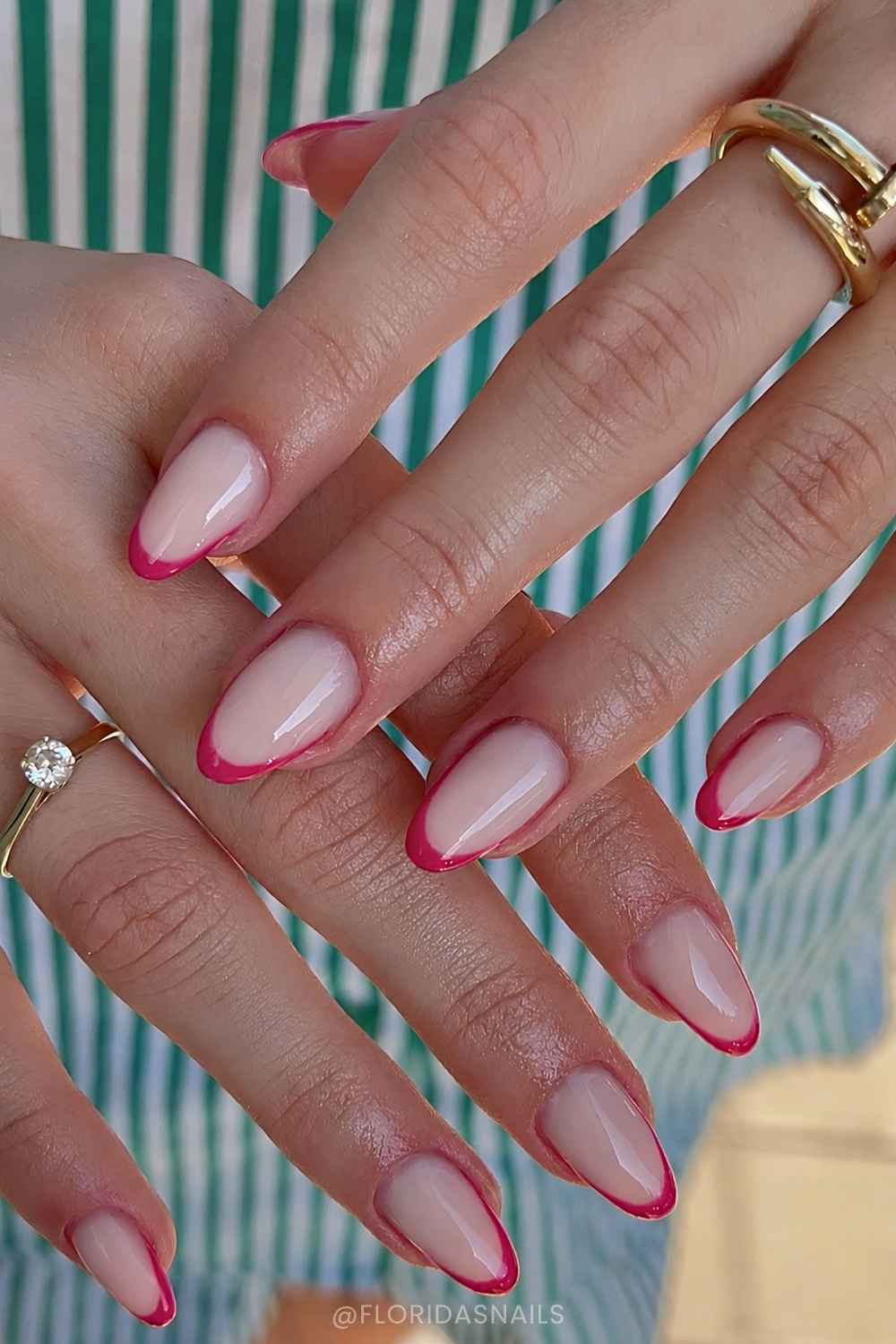 Hot pink French tip mani on milky base
