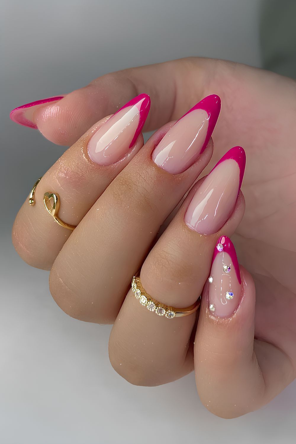 Hot pink french nails with rhinestones