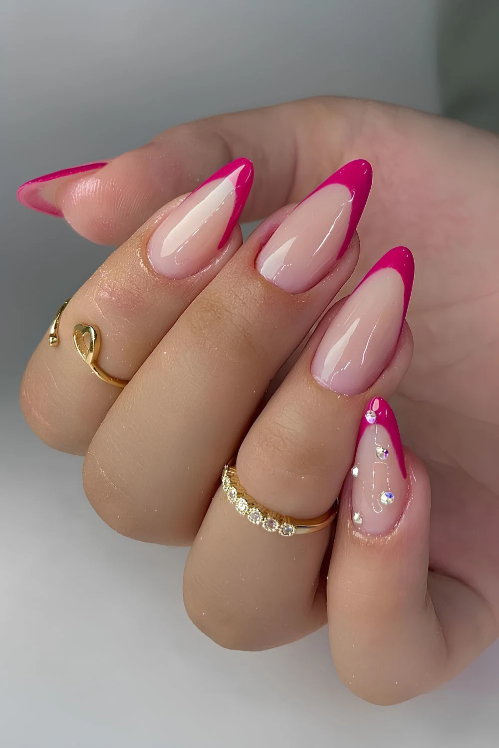 Hot pink french nails with rhinestones