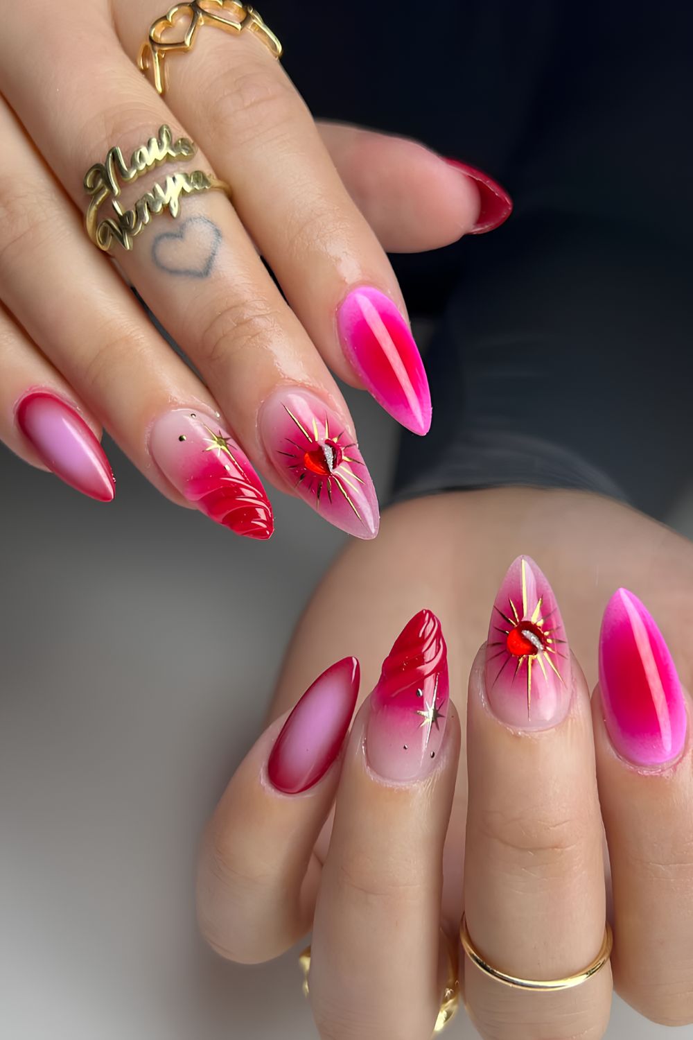 Hot pink nails with aura and 3d accents