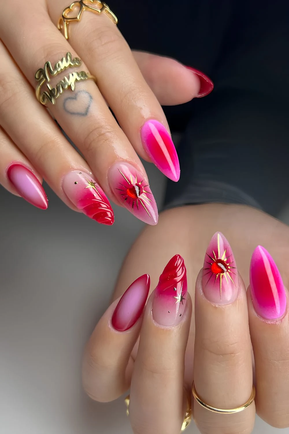 Hot pink nails with aura and 3d accents