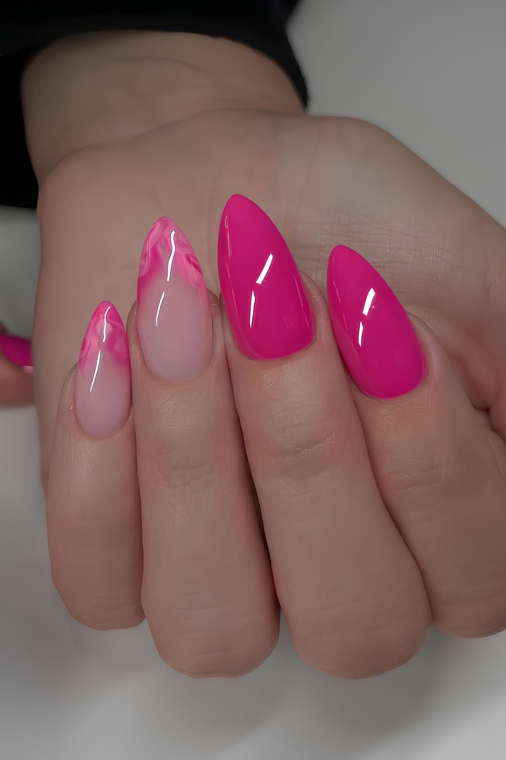Hot pink nails with marble accents