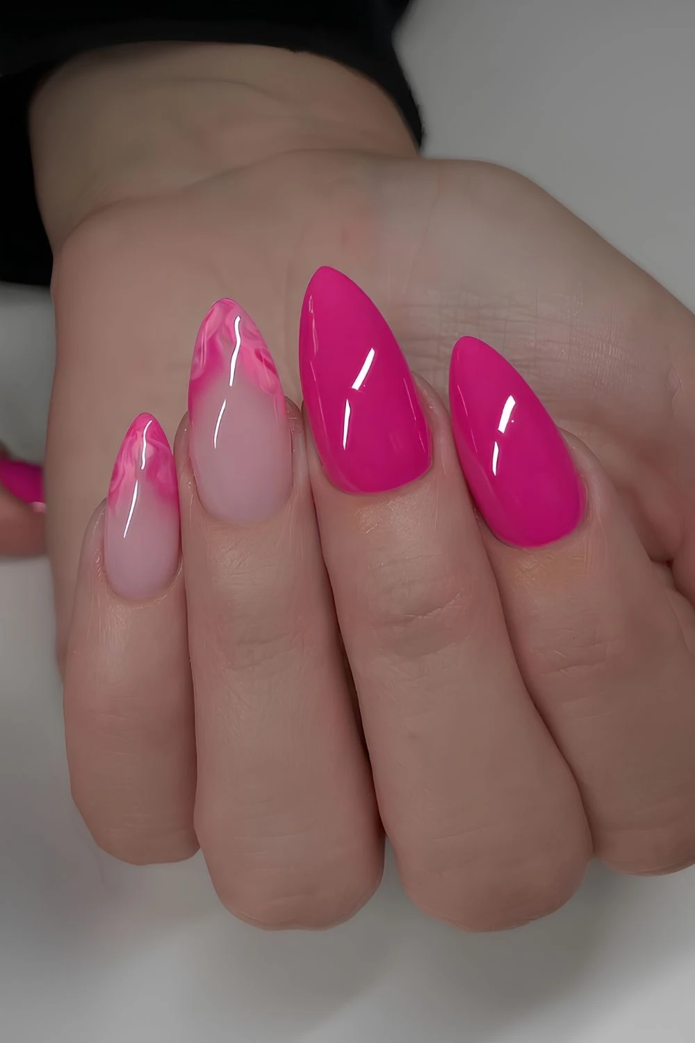Hot pink nails with marble accents
