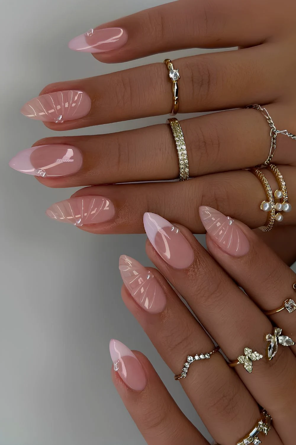 Light pink French mani with textured accents