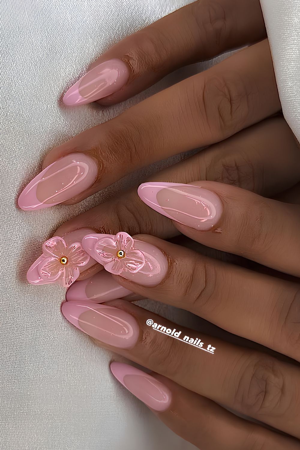 Light pink french nails with textured florals