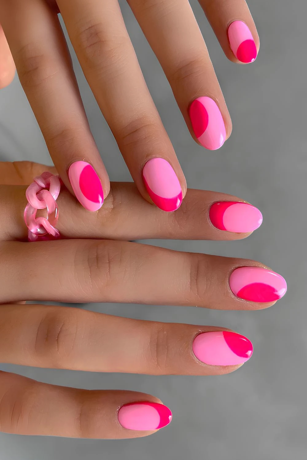 Light pink nails with hot pink accents