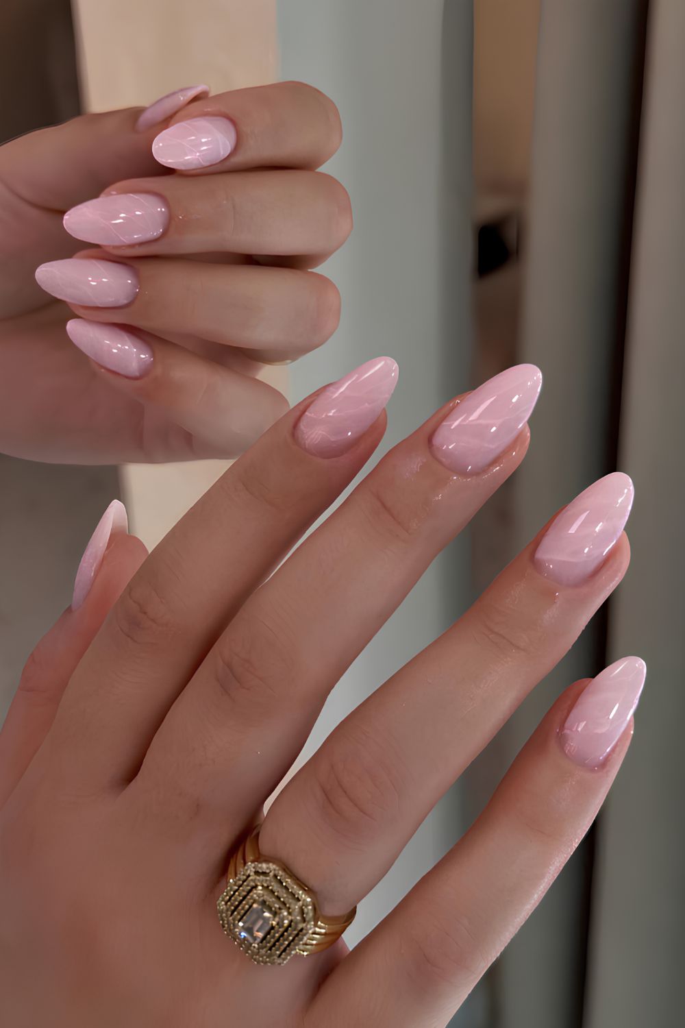 Light pink nails with marble swirls