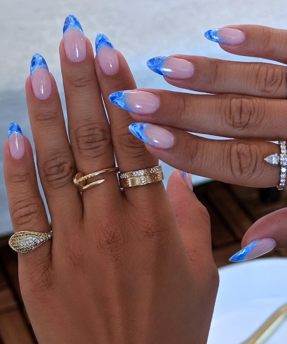 Marbled blue French tip manicure