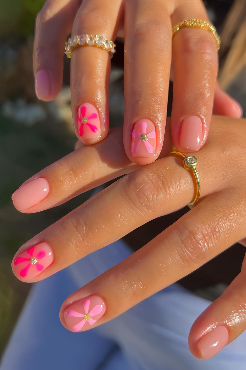 Milky nails with oversized pink florals