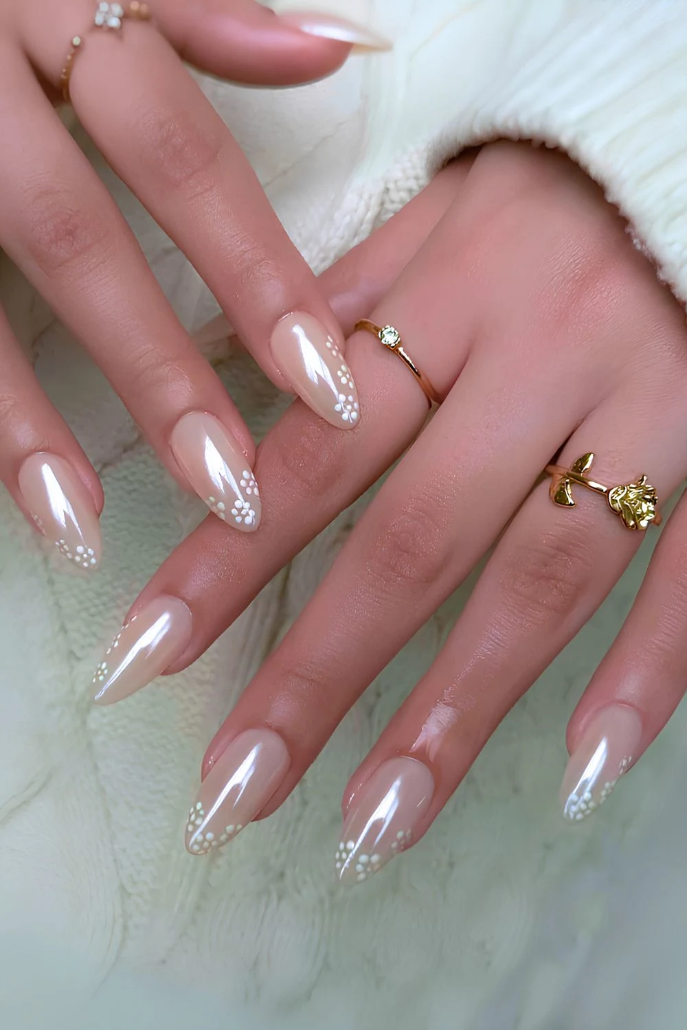 Milky white chrome nails with florals